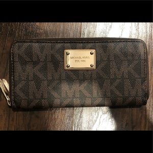 Michael Kors monogram zip around wallet